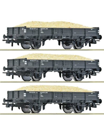 Przejdź do produktu Roco 6600259 H0 - Zestaw 3 wagonów platform typu GZMK z ładunkiem piasku, NS, ep.III